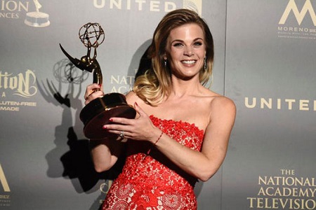 Gina receiving Daytime Emmy Award for her appearance on The Young and The Restless